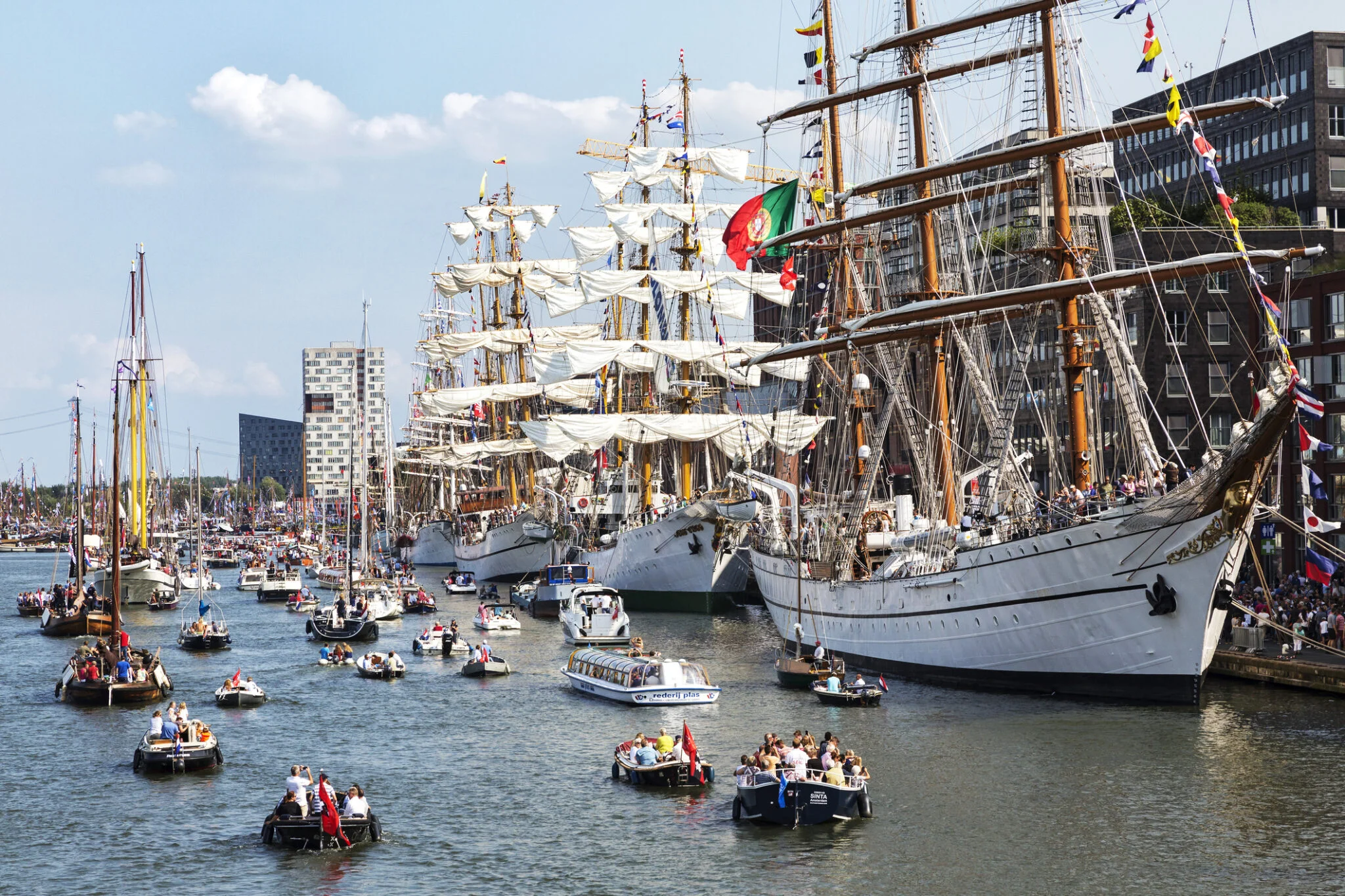 Amsterdam, The Netherlands – August 20, 2015: Tall ships and numerous small sailing boats at the Sail event in Amsterdam, there were 2,3 million of visitors in five days. The event took place from August, 19 - 23.